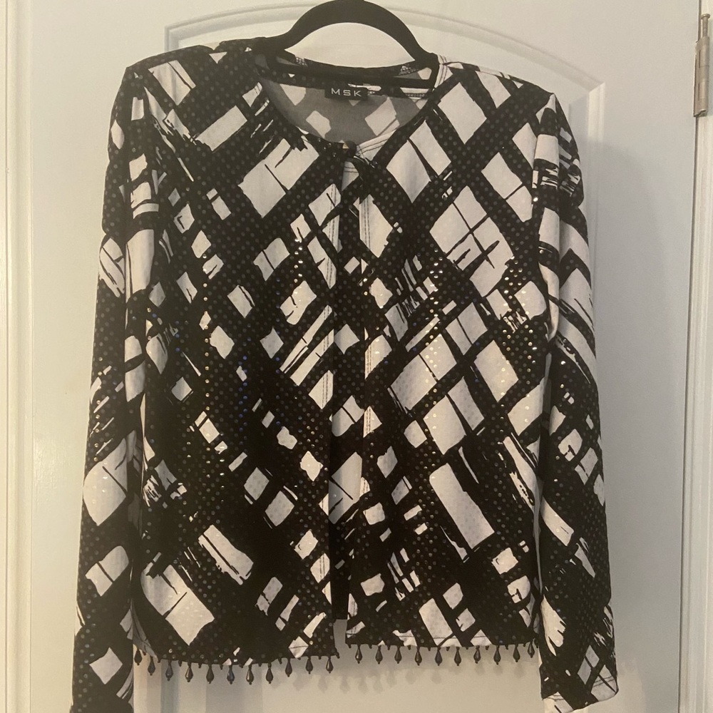 Two piece dressy camisole and Jacket. Never warn. With tags.  Size Small.